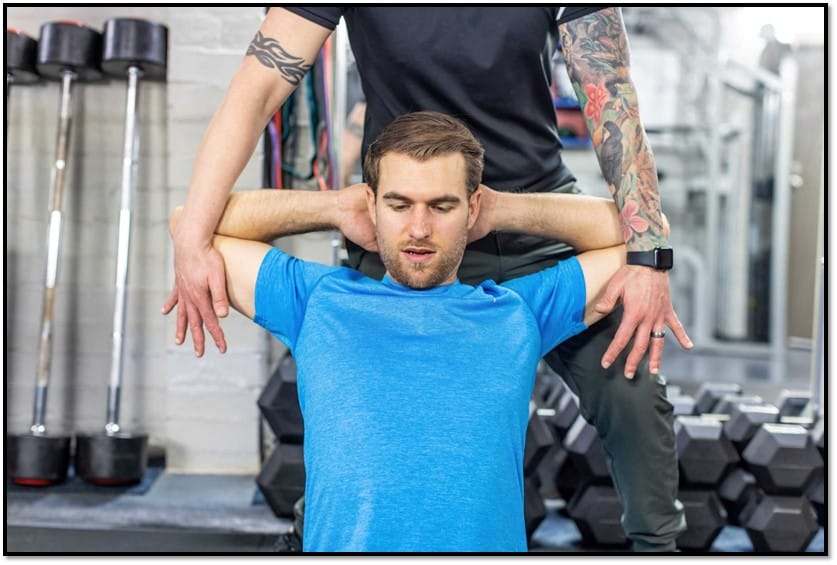 Trainer showing boxing move