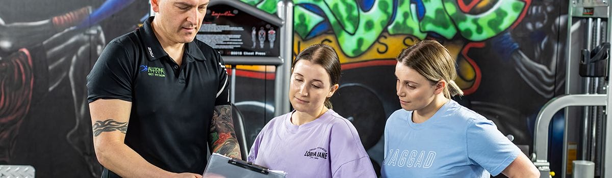 Client receiving personalized fitness guidance